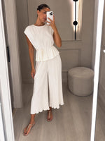 Coordinato plissettato